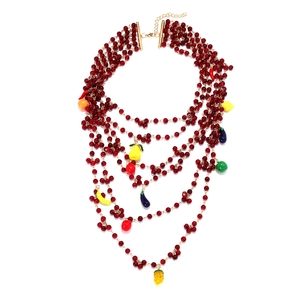Bohemian multi-layer handmade beaded necklace with colorful fruit pendants on white background
