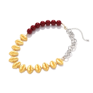 Exaggerated gold lips and dark red beads with silver chunky chain statement necklace