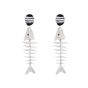 Statement silver alloy fishbone drop earrings with black and white striped details