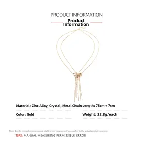 Detail of gold double-layer dragonfly pendant necklace with crystal and chain specs