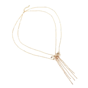 Double-layered gold dragonfly necklace with long tassel pendants and layered metal chains