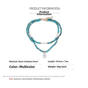 Detail of layered resin bead necklace with measurements and pearl pendant description