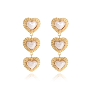 Vintage gold heart earrings with triple layered baroque pearls and textured metal frames