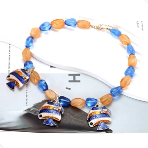 Tropical ocean style resin necklace featuring colorful fish pendants and orange blue beads