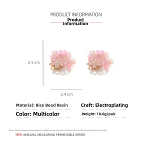 Detailed view of handmade beaded flower earrings with pink and white petals and dimensions