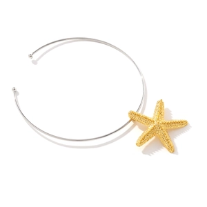 Minimalist gold starfish pendant necklace with silver metal choker on white background