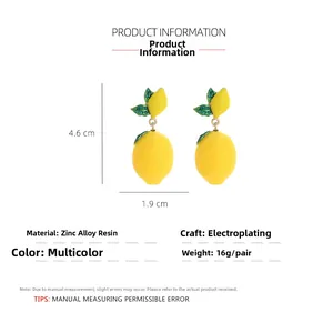Detail view of lemon earrings showing 4.6cm size and zinc alloy resin materials