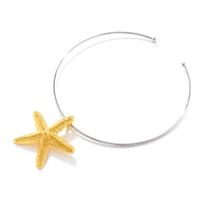 Minimalist gold starfish pendant on a silver metal collar necklace for women