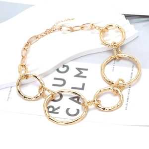 Golden chunky chain necklace with irregular hammered texture rings and adjustable extension