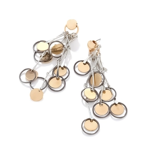 Detail of long fringe drop earrings with gold, silver and gunmetal layered disks