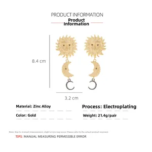 Detail view of gold sun and moon drop earrings with zinc alloy plating and dimensions