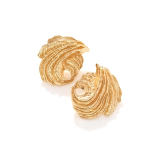 Detailed view of irregular golden wave texture on asymmetric metallic leaf earrings
