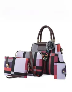 Detailed view of the 4-piece fashion handbag set featuring red checkered patterns