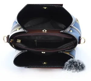 Internal structure of checkered tote bag featuring central zipper and magnetic side pockets