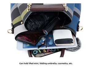 Top view of striped tote bag interior showing capacity for iPad mini and umbrella