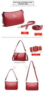 Detail view of red lychee pattern leather bag with dual straps and golden hardware