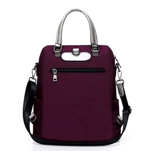 Sac à dos polyvalent en nylon bordeaux pour femme avec poignées argentées et sangle