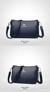 Close-up of blue crossbody bag with gold kangaroo logo and pebbled leather texture
