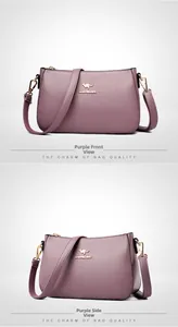 Detail of purple litchi grain texture and gold kangaroo logo on minimalist crossbody bag