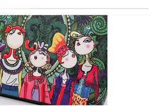 Close-up of vibrant cartoon fashion illustrations and fabric texture on a tote bag