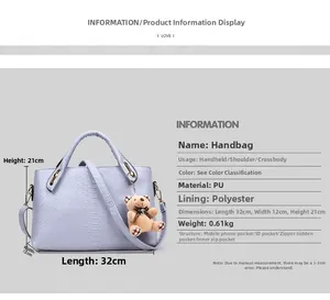 Detail view of purple snake pattern PU leather handbag with bear charm and size dimensions