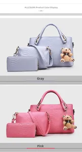 Detailed set of three textured faux leather bags with bear charms in pink and gray