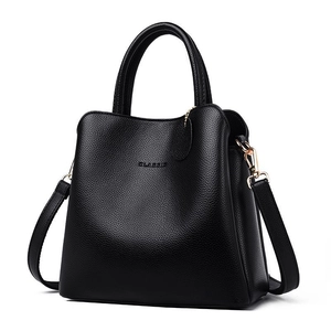 Classic black litchi pattern PU leather handbag with dual handles and gold-tone hardware