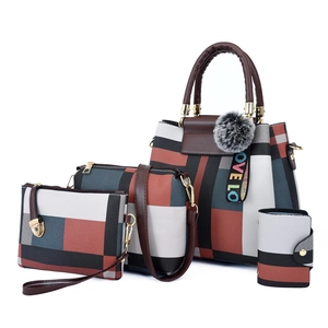 Modern 4-piece handbag set featuring patchwork geometric pattern and charm