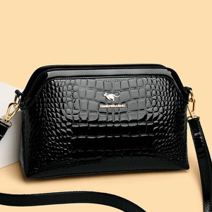 Elegant black patent faux-leather handbag with crocodile pattern and gold metal hardware