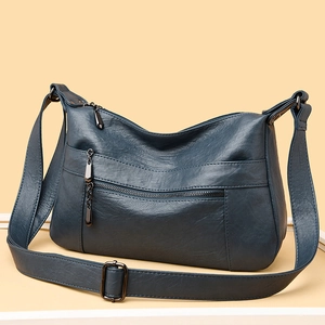 Dunkelblaue Schultertasche aus Kunstleder mit verstellbarem Gurt und Reißverschlussfächern