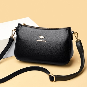 Chic black litchi leather crossbody bag for women featuring golden metal logo and zipper