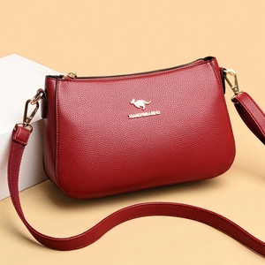 Deep red lychee texture leather crossbody bag with golden kangaroo logo for women