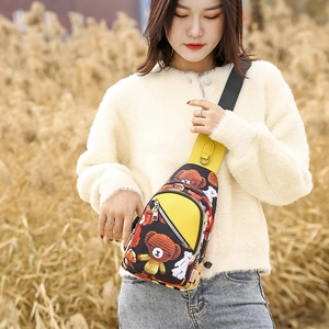 Detail of cartoon teddy bear oxford cloth waist bag with adjustable black shoulder strap