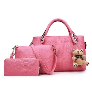 Pink faux leather 3-piece bag set with crocodile texture and cute plush bear charm