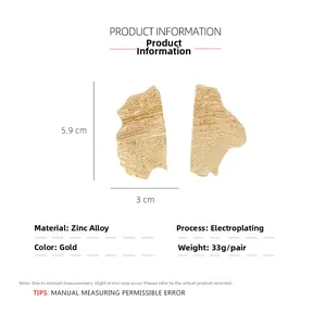 Macro view of gold zinc alloy earrings with hammered texture and precise dimension detail