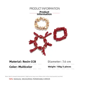 Detailed view of handmade resin coral beads and gold CCB block bracelets in a 3-piece set