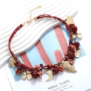 Handmade red braided cord necklace with gold alloy palm moon and heart charms