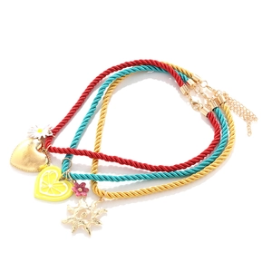 Three-piece summer ocean style cord necklace set with heart and sun flower pendants