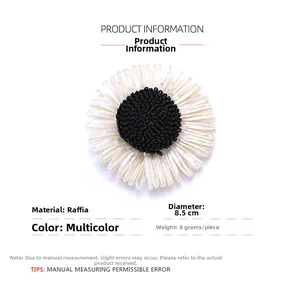 Detail view of 8.5cm handmade raffia sunflower hair clip with dimensions and weight data