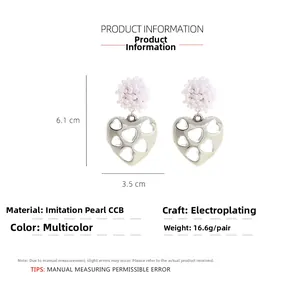 Detailed view showing product dimensions and materials of hollow heart beaded earrings