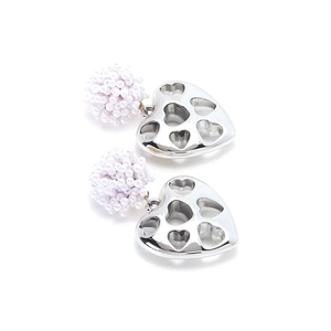 Detailed view of handmade beaded heart drop earrings with silver finish and purple beads