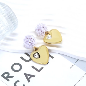 Vintage style handmade beaded heart earrings with gold pendant and sparkling crystal