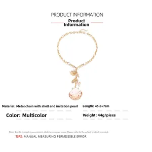Détail du collier avec pendentifs coquillage et perle et mesures de taille