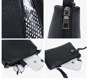 Détail du sac à main en cuir grainé noir avec bordure serpent et fermoir métallique