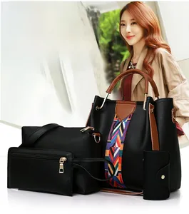 Detail view of 4-piece black faux leather bag set with colorful ethnic patterned straps