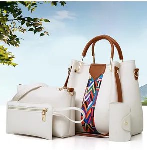 Detailed set of four white textured leather bags with brown trim and colorful straps