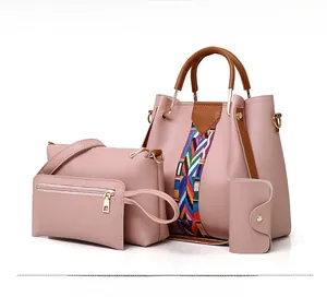 Pink 4-piece composite bag set featuring ethnic strap accent on textured PU leather