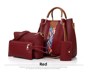 Detail view of the red 4-piece handbag set featuring colorful geometric woven straps