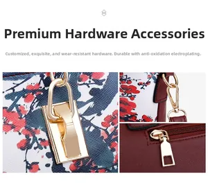 Detail of durable gold-tone hardware on wine red floral handbag with anti-oxidation coating