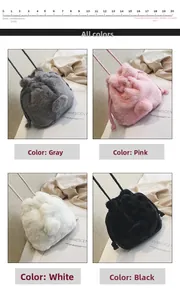 Detail view of plush faux fur drawstring bucket bags in grey, pink, white and black